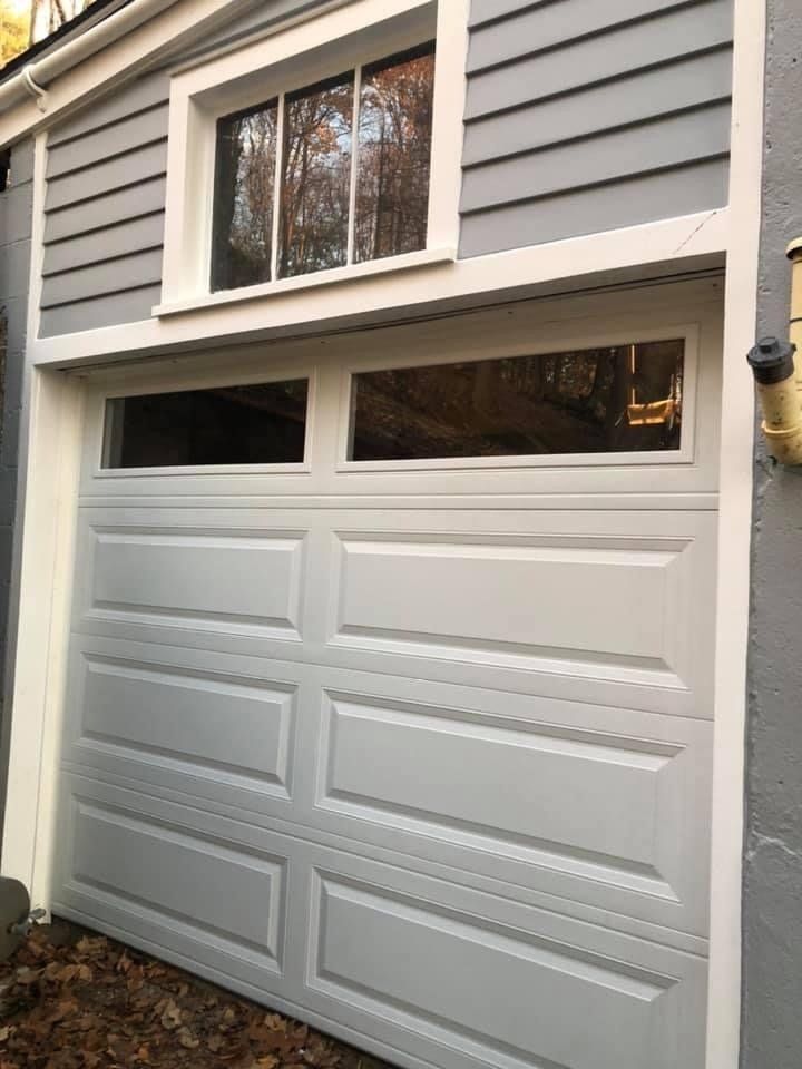 White garage door with windows