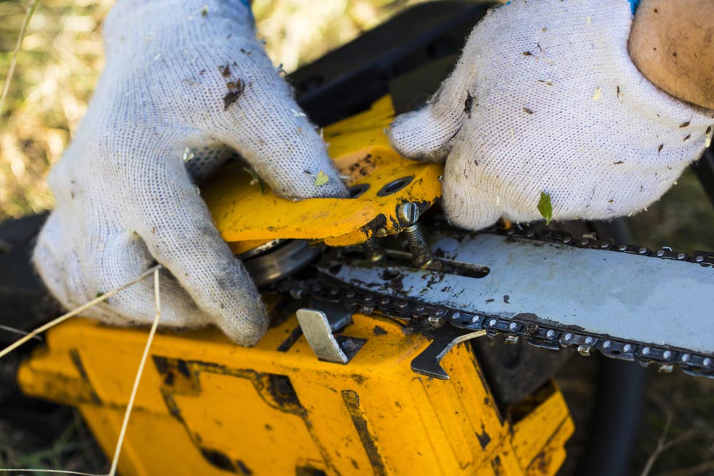 Chainsaw Being Repaired — Coffs Chainsaw and Mower in Coffs Harbour, NSW