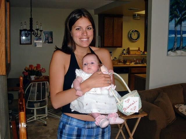 Young Hannah holding baby Briannah