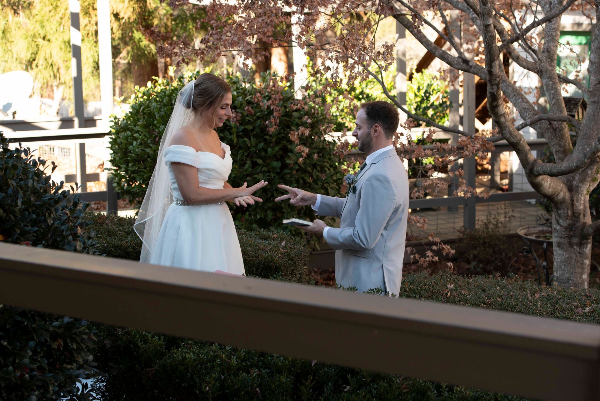 Couple exchanging private vows outdoors during intimate wedding moment at mountain venue