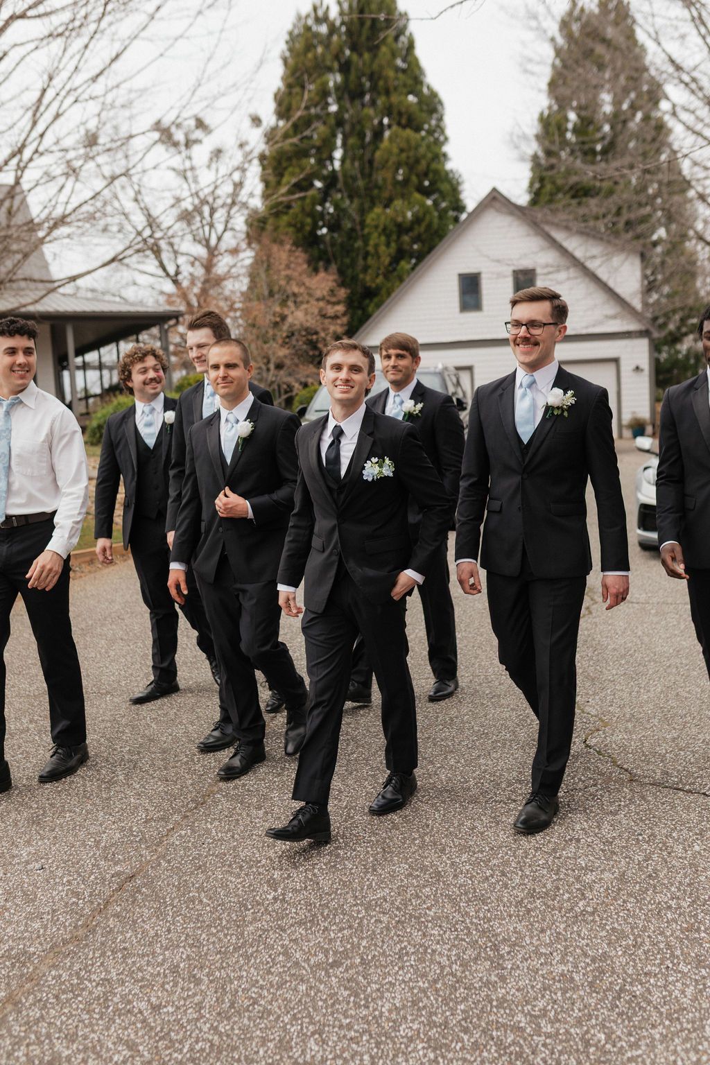 Groomsmen arriving together before ceremony at western North Carolina wedding venue