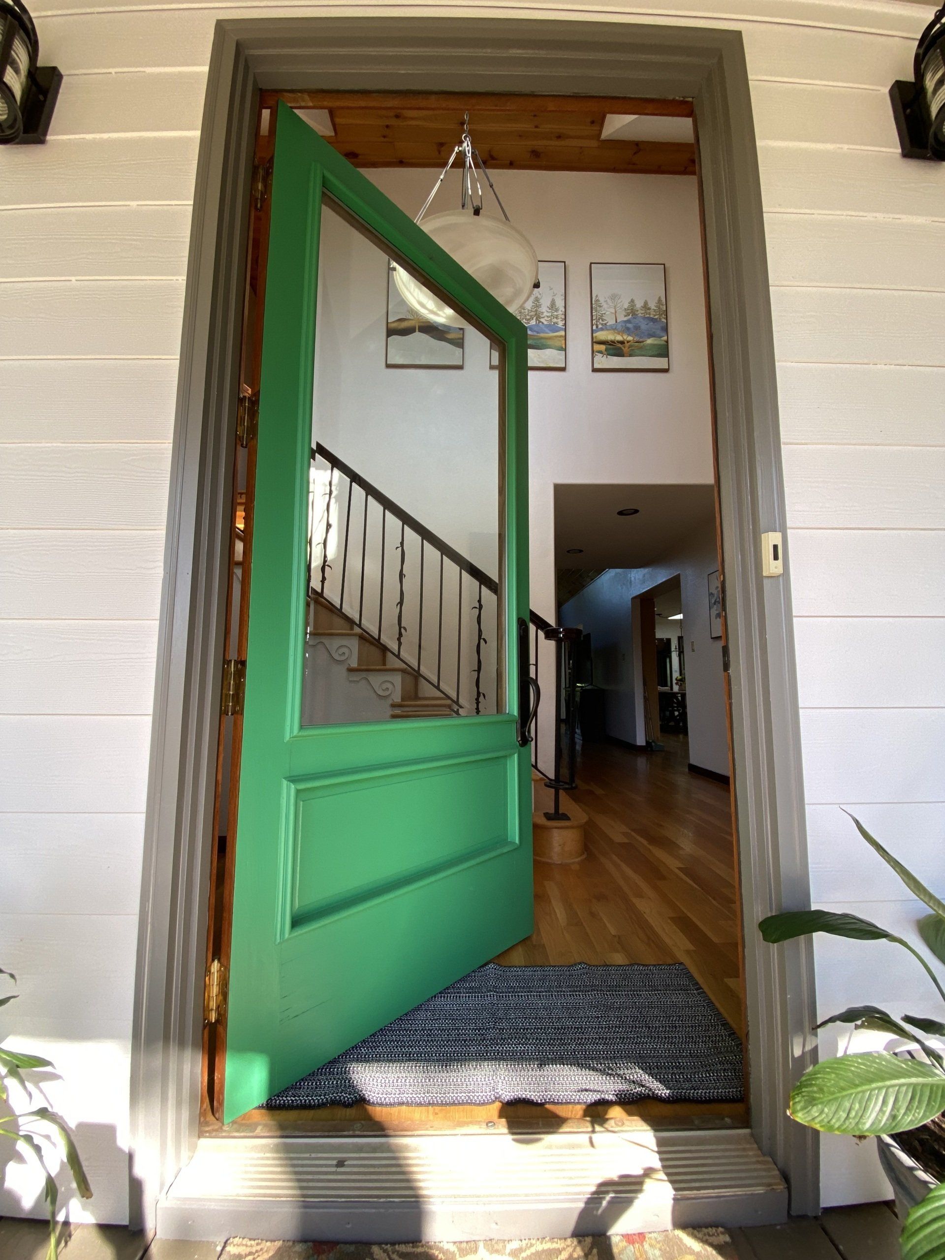 Front door opening into two story foyer at Hilltop House Serenity Ridge