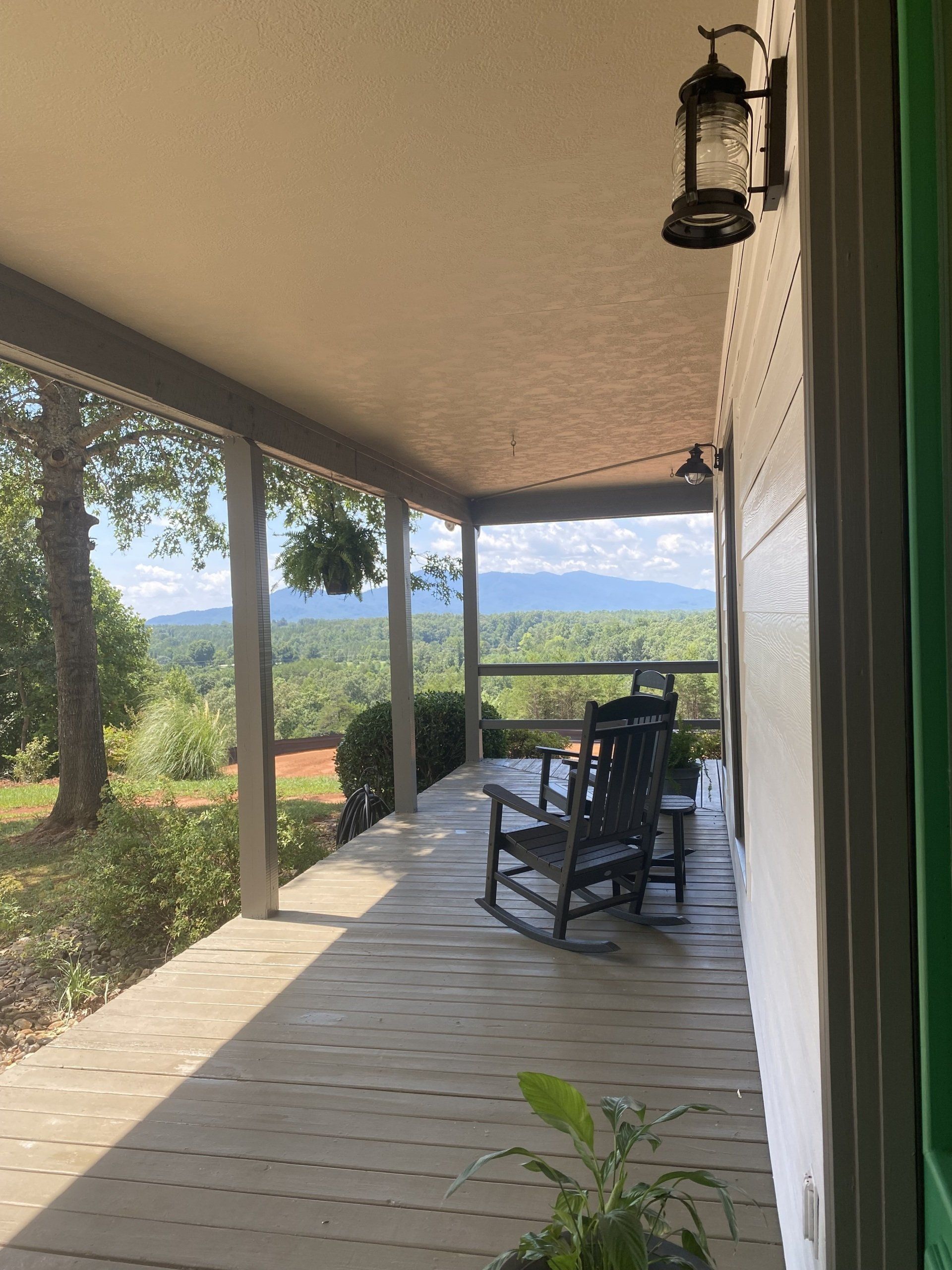 Deck at Hilltop House with mountain views at Serenity Ridge