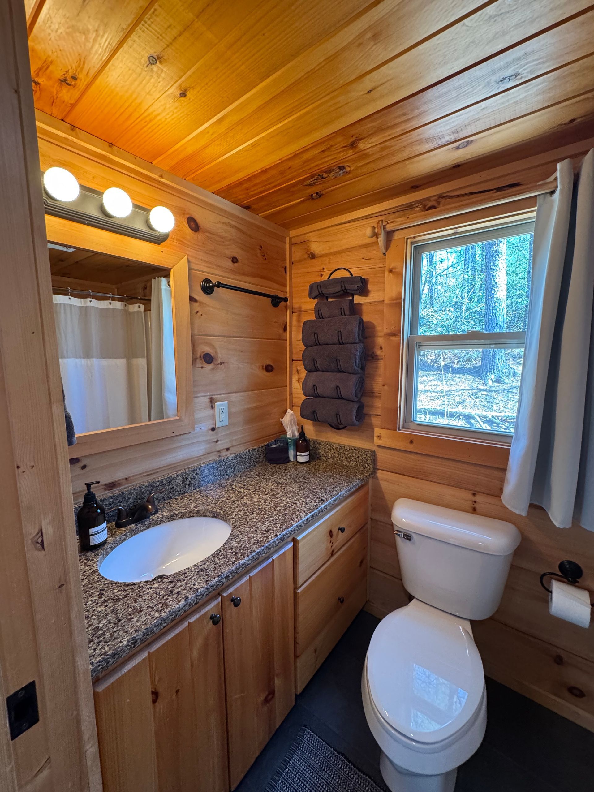 Bathroom inside Cabin F at Serenity Ridge mountain wedding venue lodging