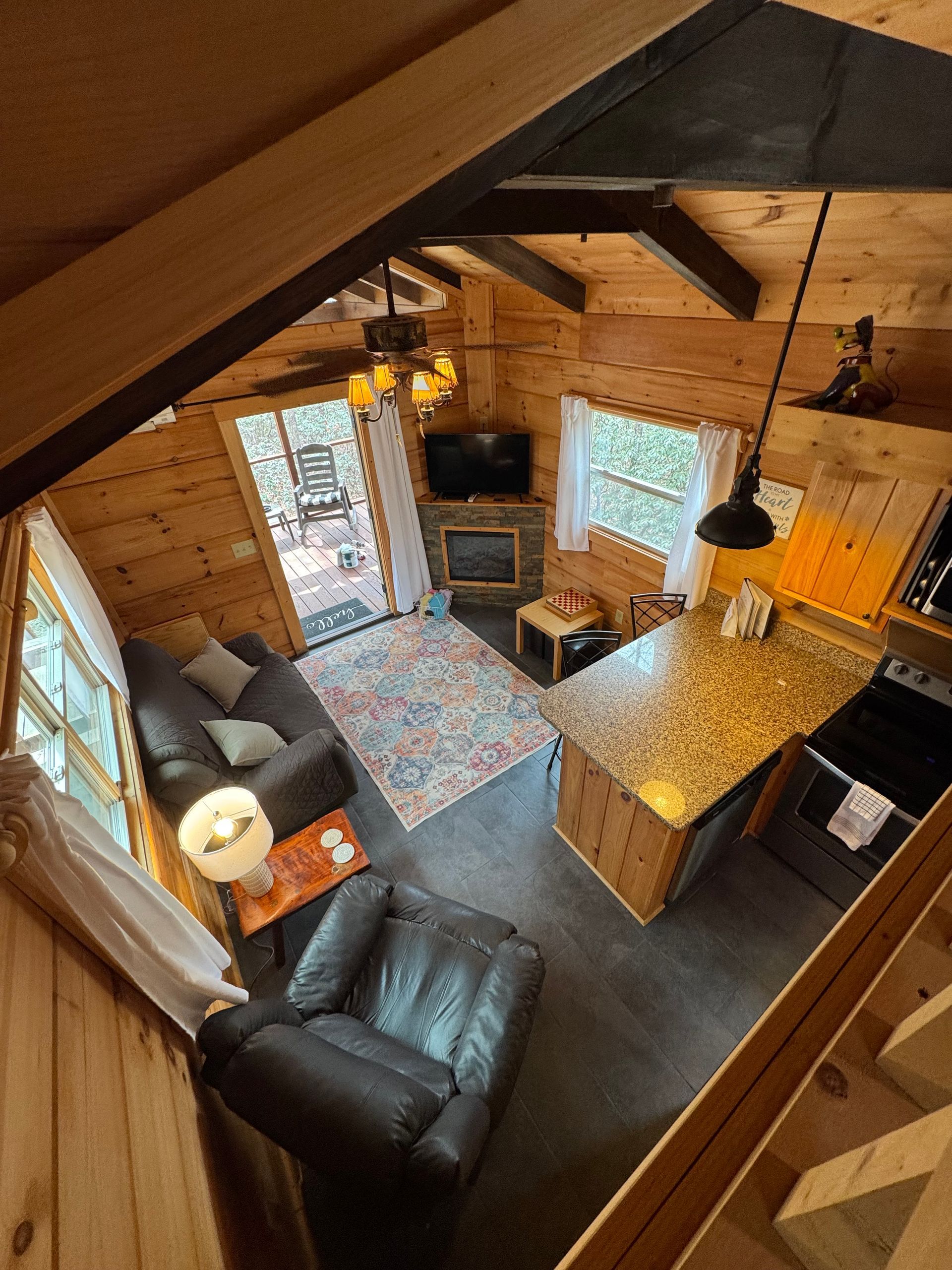 Living room inside Cabin D for relaxing during a wedding weekend at Serenity Ridge