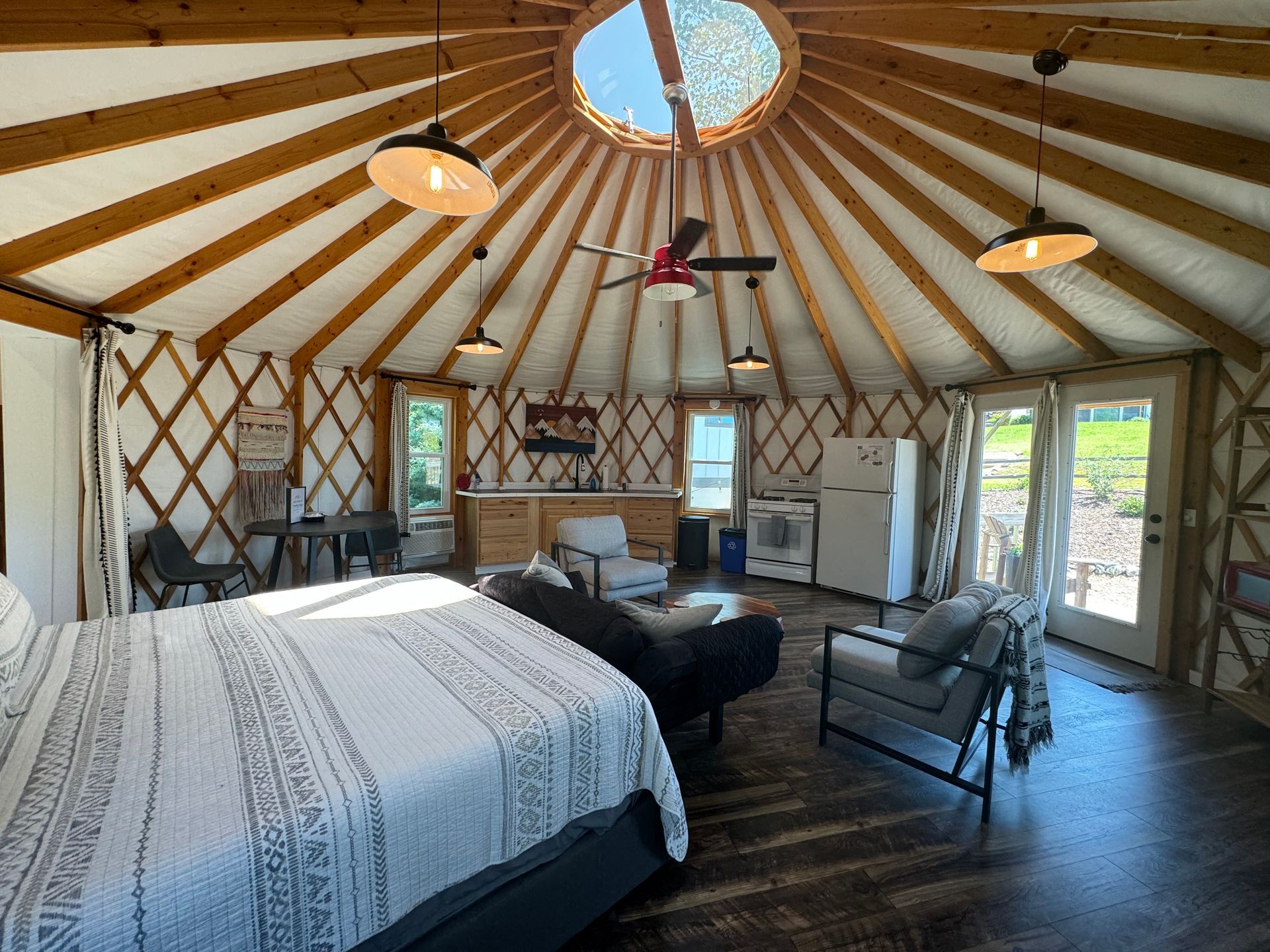 Kitchen inside glamping yurt at Serenity Ridge for guest use
