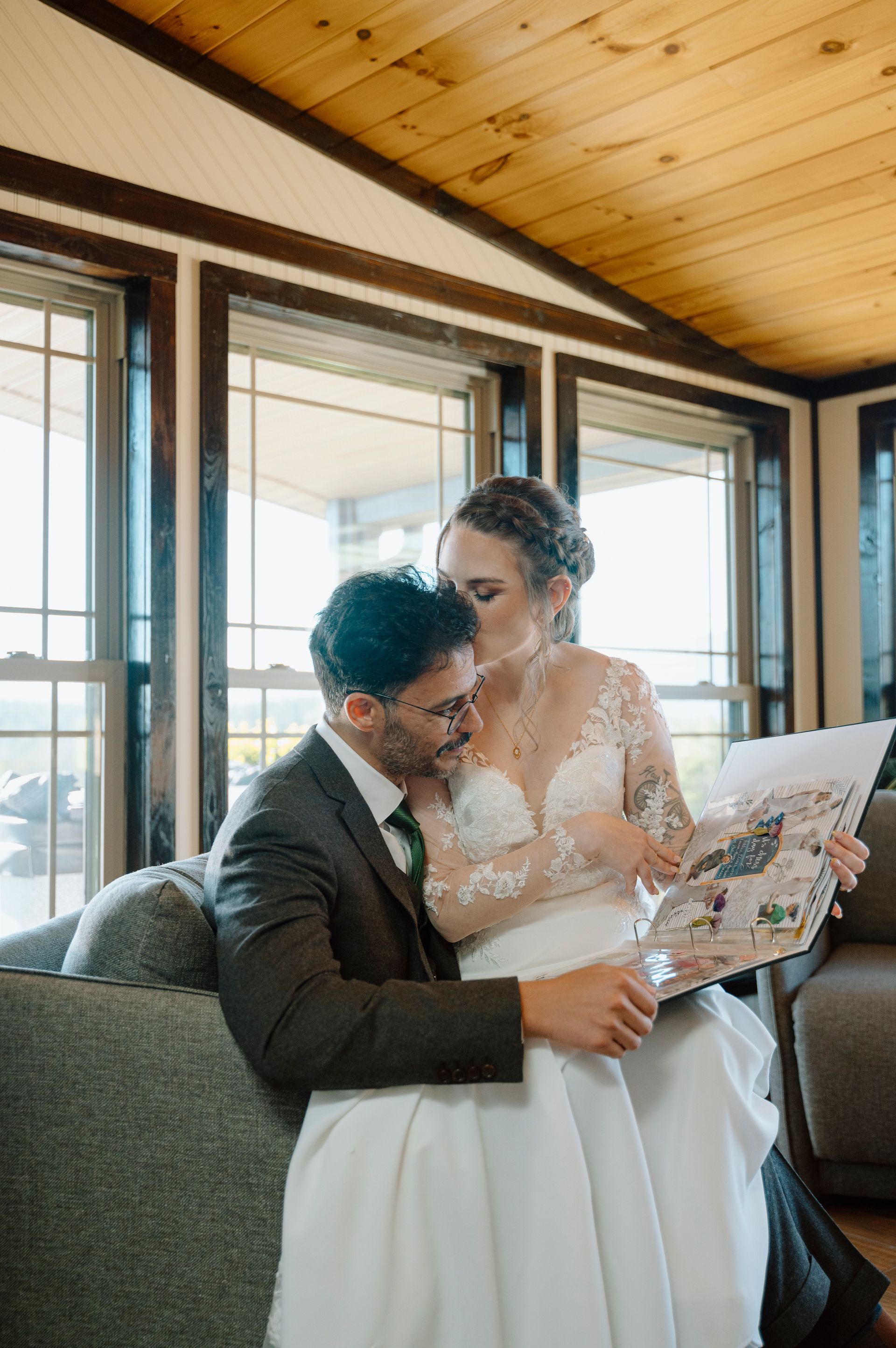 Couple sharing a quiet moment indoors during wedding weekend stay at mountain lodging