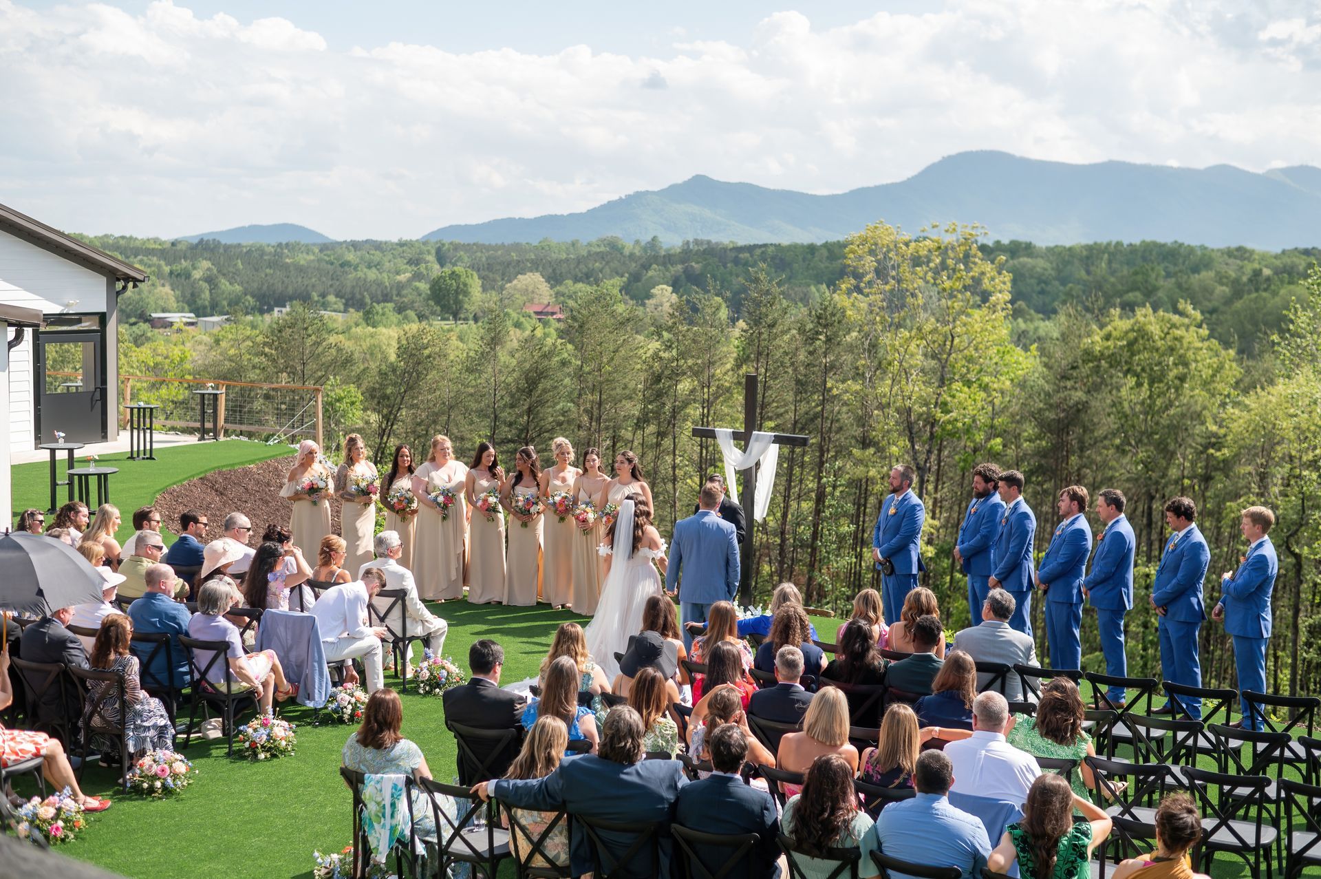 Outdoor wedding ceremony overlooking Blue Ridge mountain scenery near Asheville, North Carolina