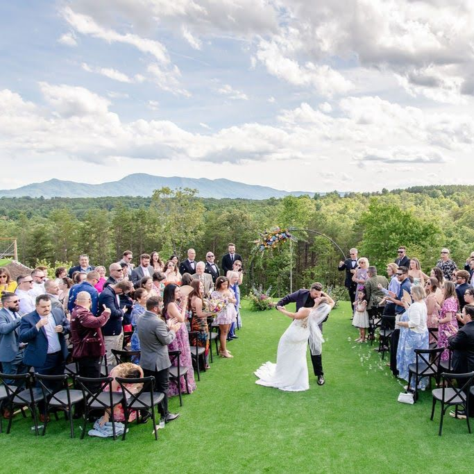 Outdoor ceremony overlooking the Blue Ridge Mountains at Serenity Ridge near Lake Lure, NC