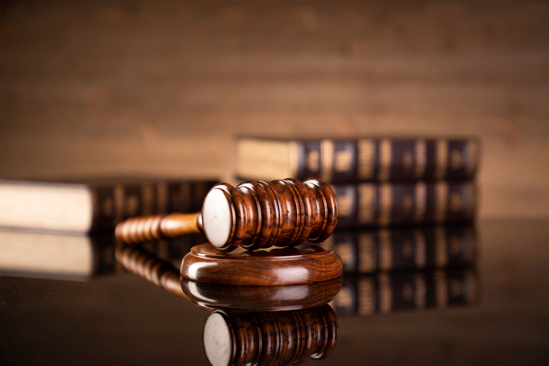 wooden gavel and law books