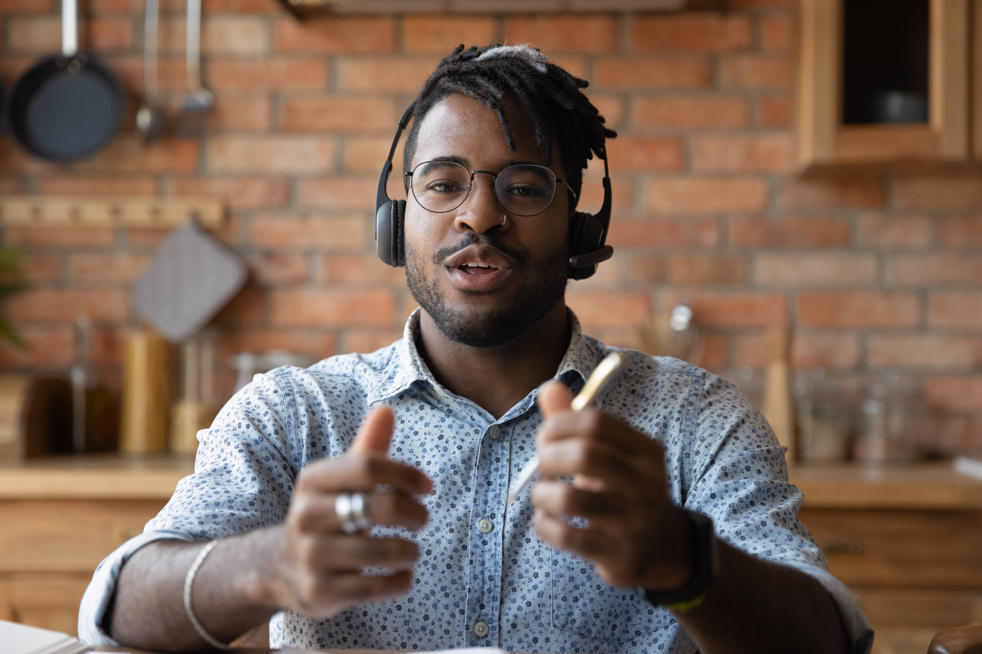 Founder recording a remote video session with a headset
