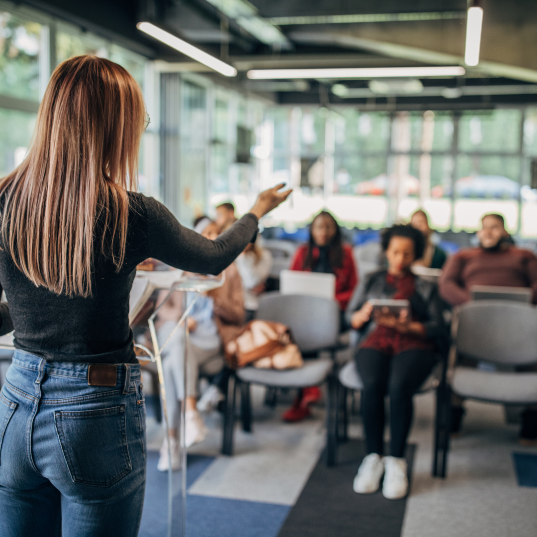woman facilitating a workshop 
