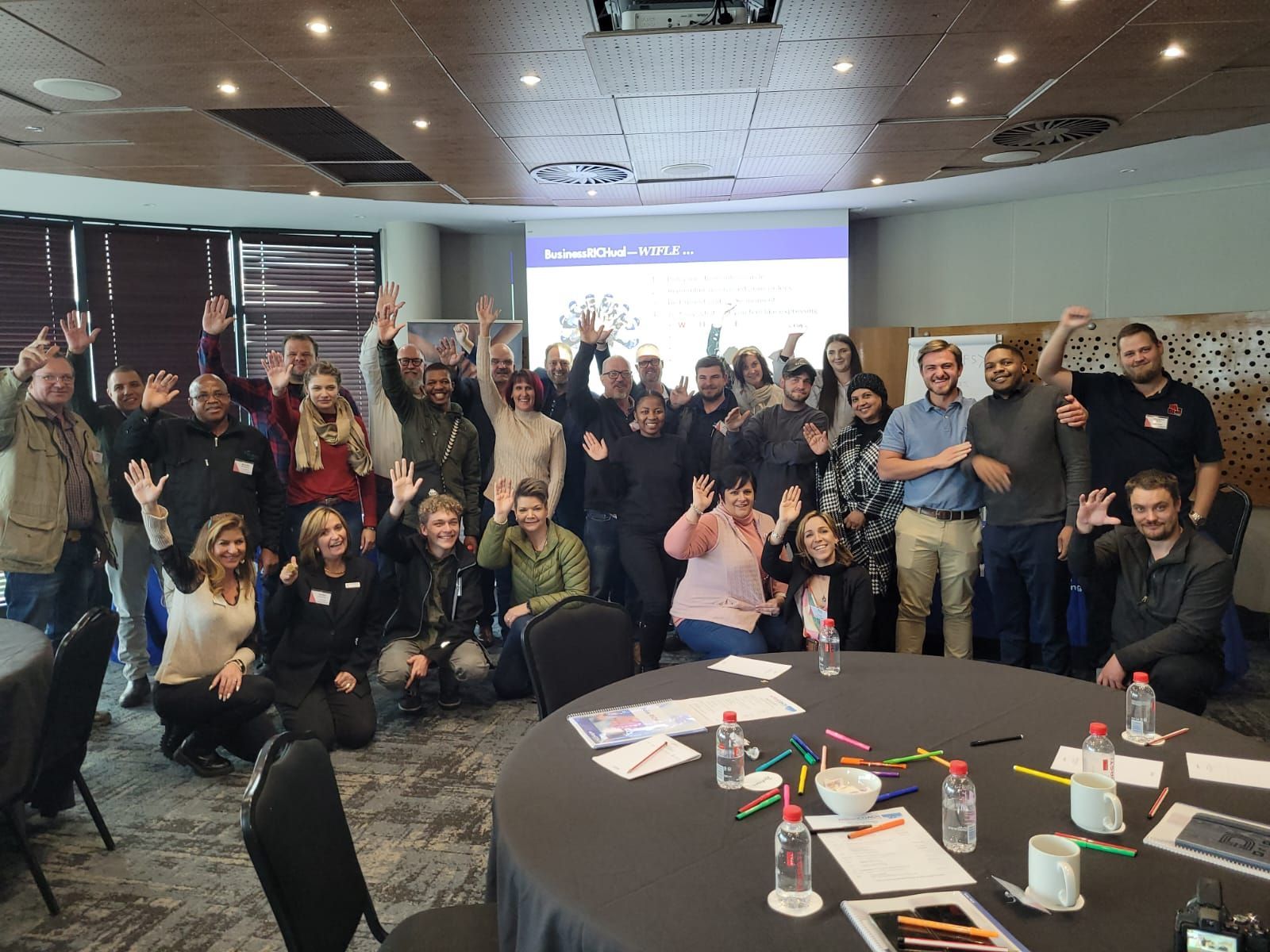 people posing for photo after workshop
