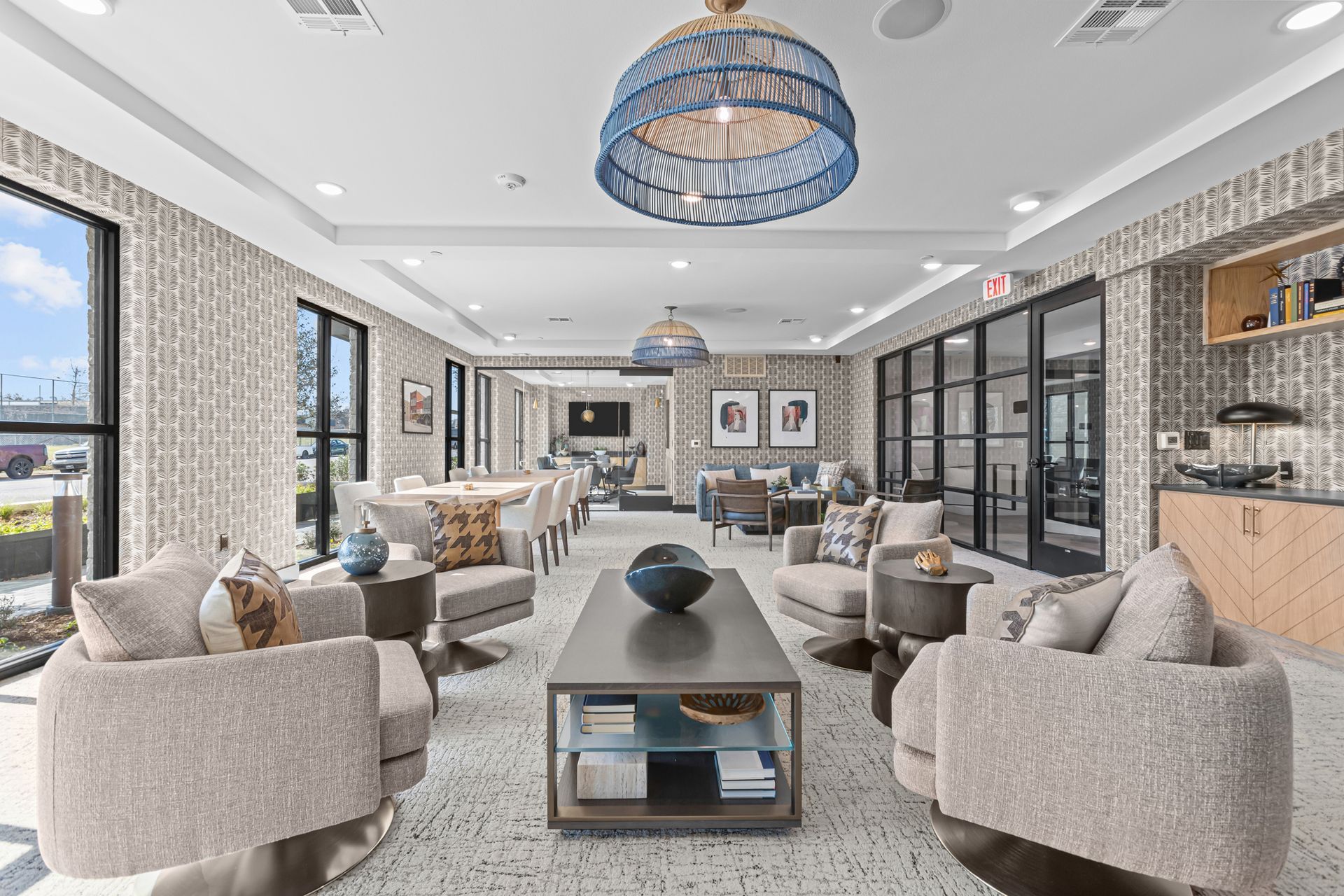 A living room filled with furniture and a table.