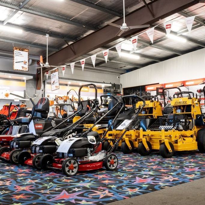 Lawn Mowers Displayed In A Store, Featuring Various Models — Whitsunday Mowers In Proserpine, QLD