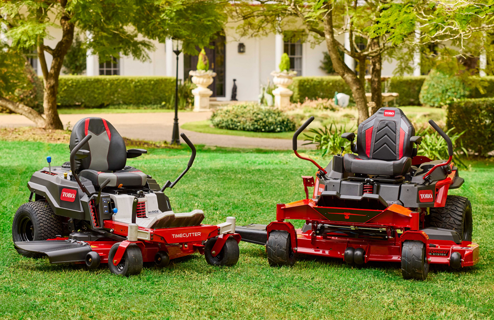 A Row Of Orange And White Stihl Lawn Mowers — Whitsunday Mowers In Cannonvale, QLD