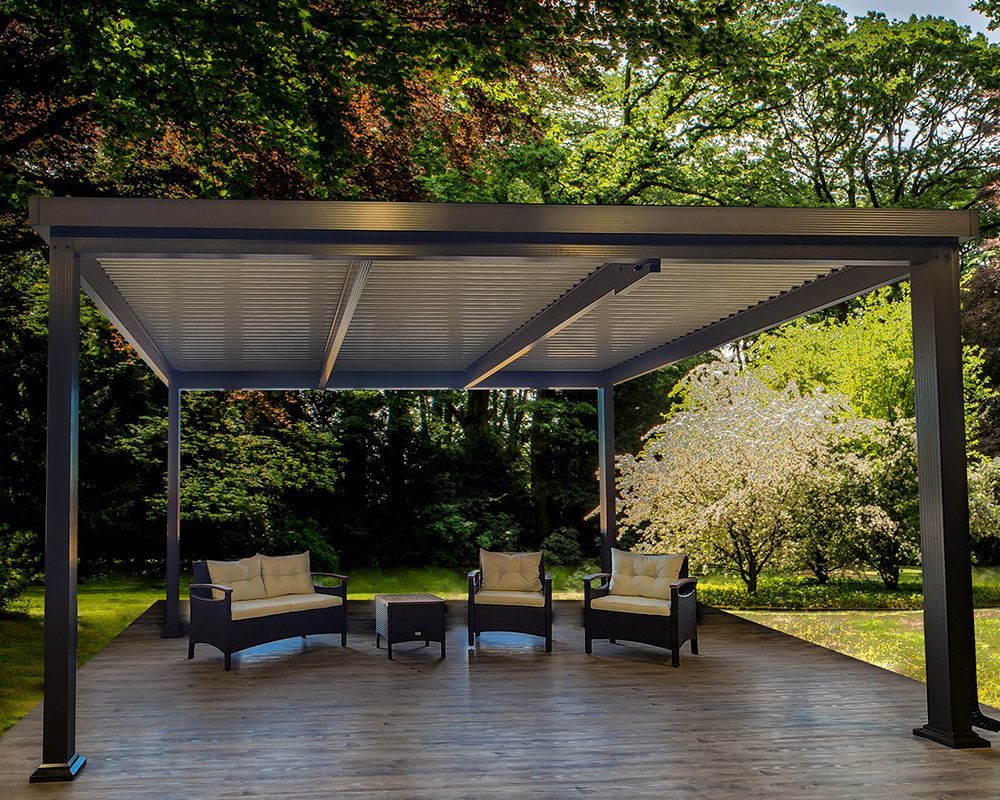 A pergola with chairs and a couch underneath it