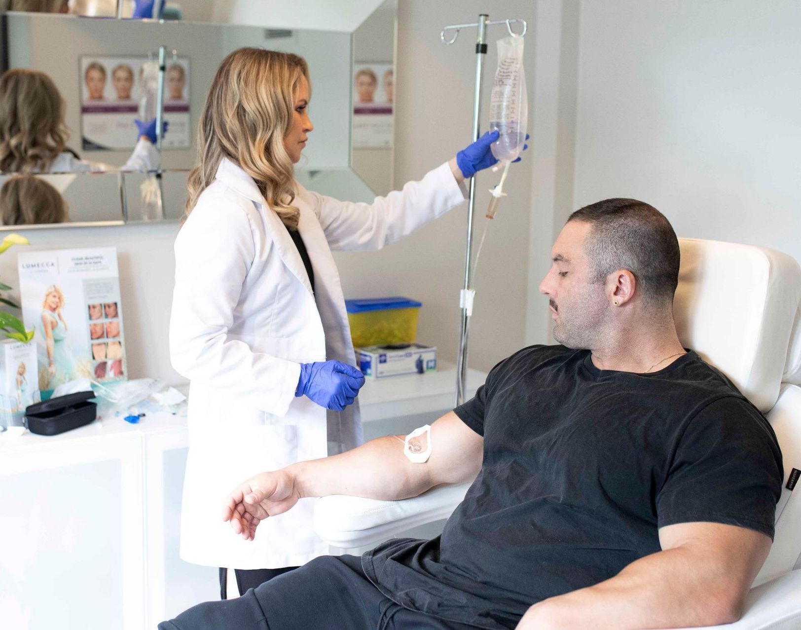 man getting vitamin iv drip