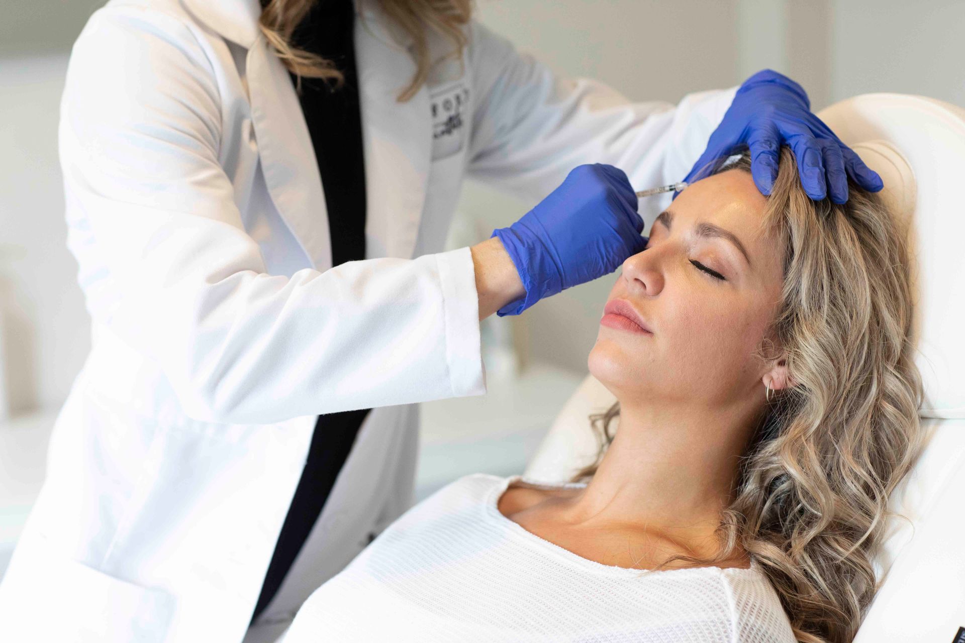 woman getting filler in chin