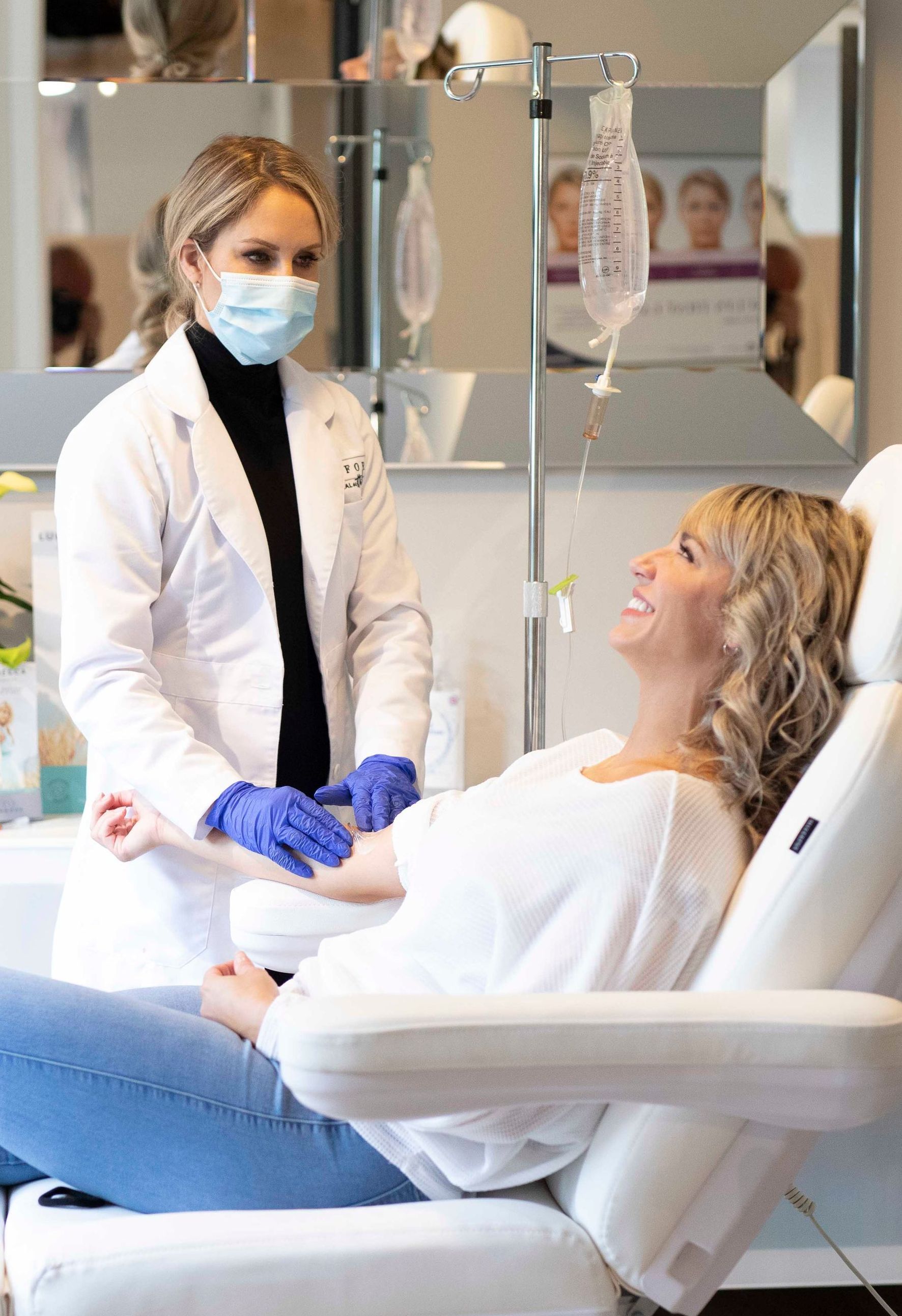 woman getting vitamin drip iv
