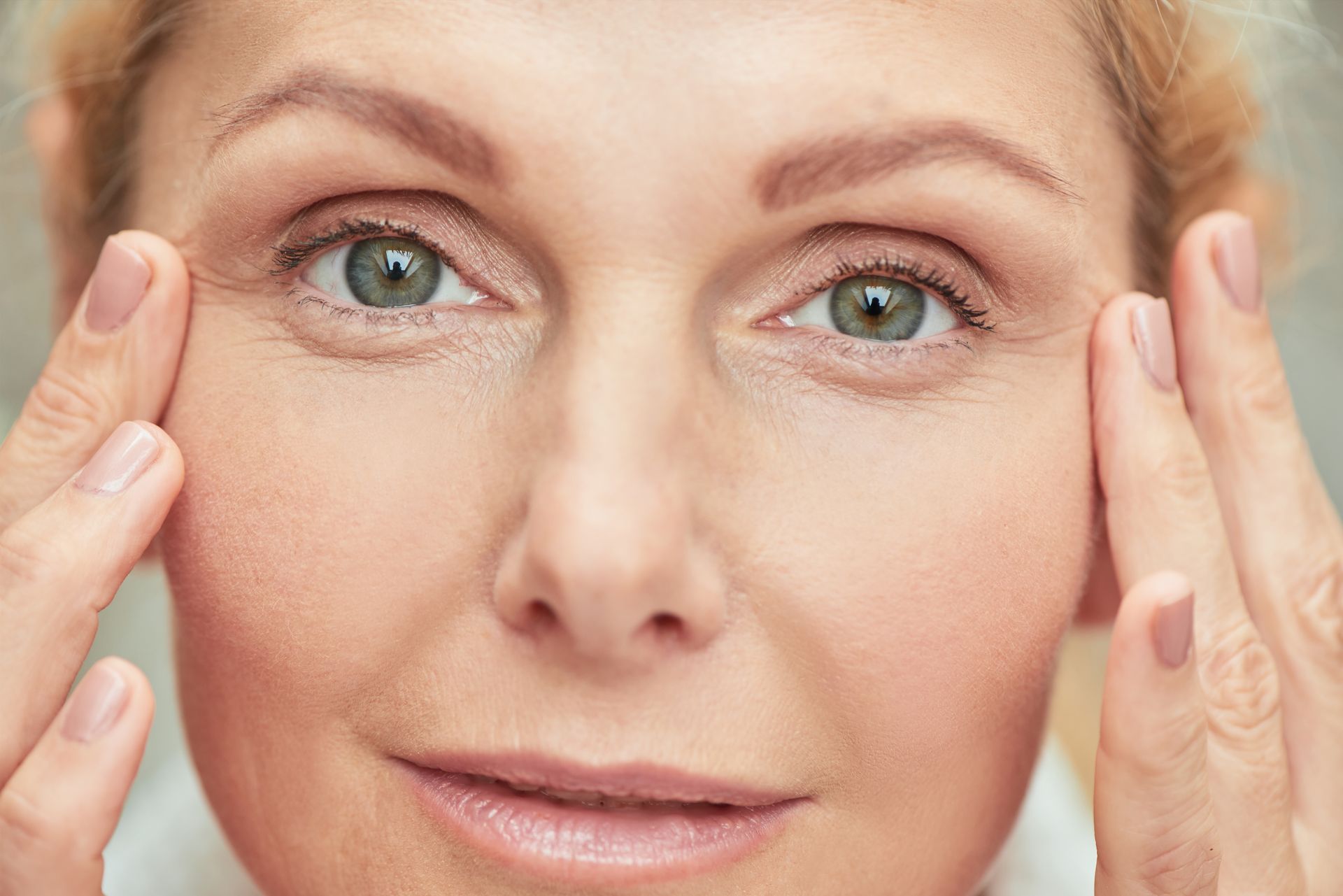 middle aged woman looking in camera