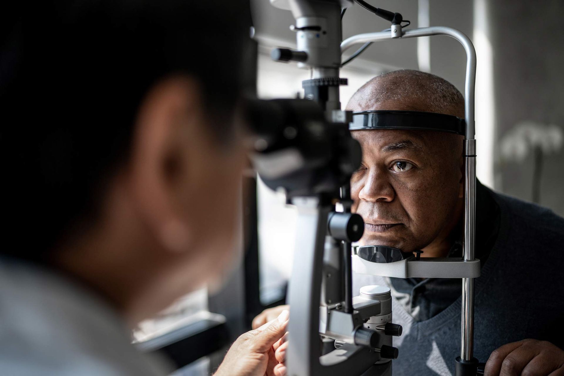 A man is getting his eyes examined