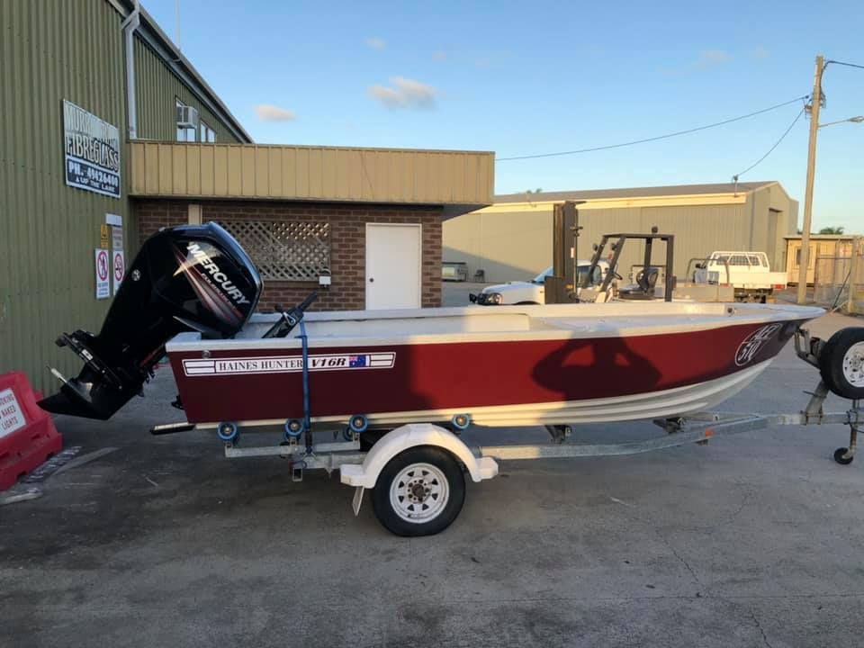 A Red Boat With A Mercury Outboard Motor On A Trailer — Murraycraft Fibreglass In Glenella, QLD