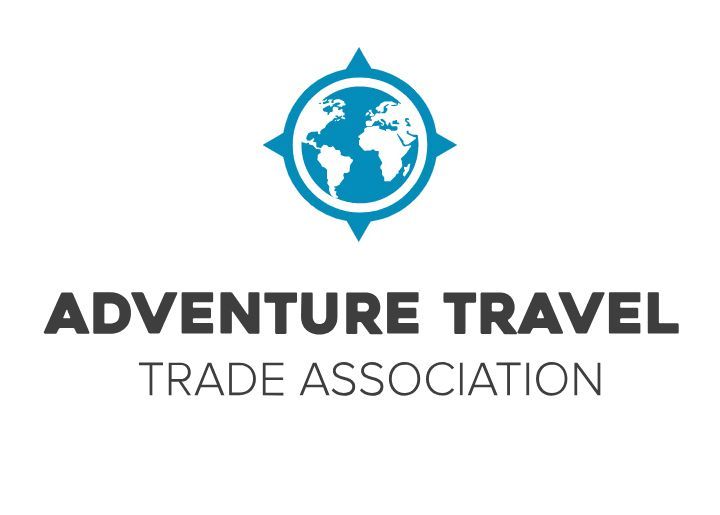 Adventure Travel Trade Association logo with blue globe compass icon and bold gray text
