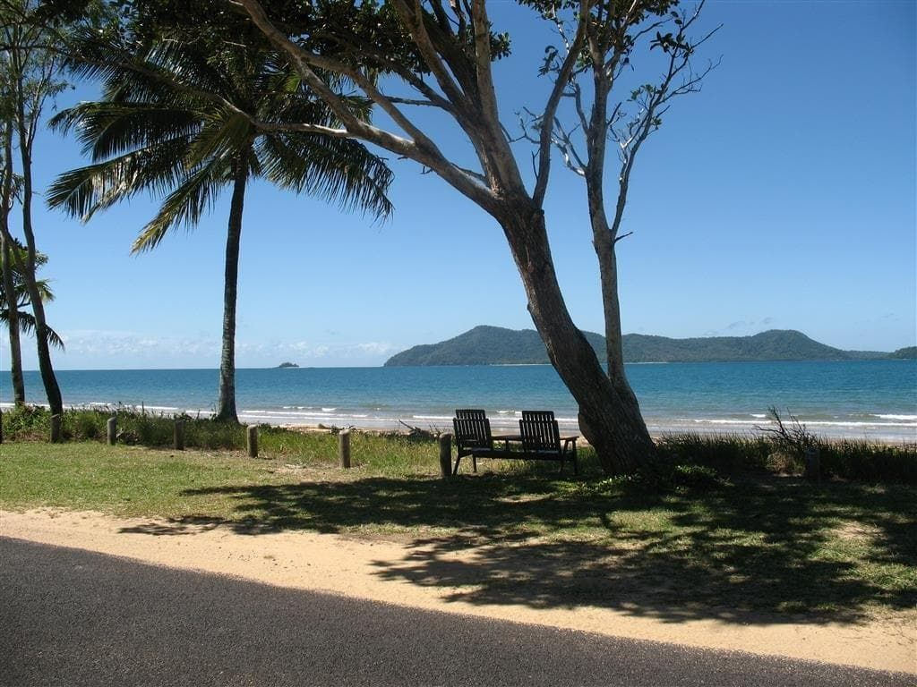 A View of The Ocean from A Park Bench — Mission Beach Property Management in Wongaling Beach, QLD