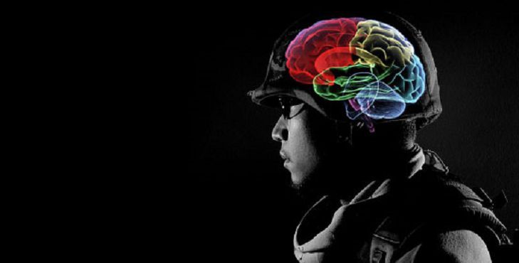 Profile silhouette with a colorful illustrated brain overlay on a black background