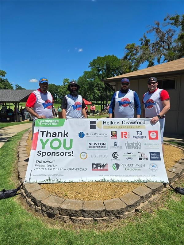 A group of men are standing next to a sign that says `` thank you sponsors ''.