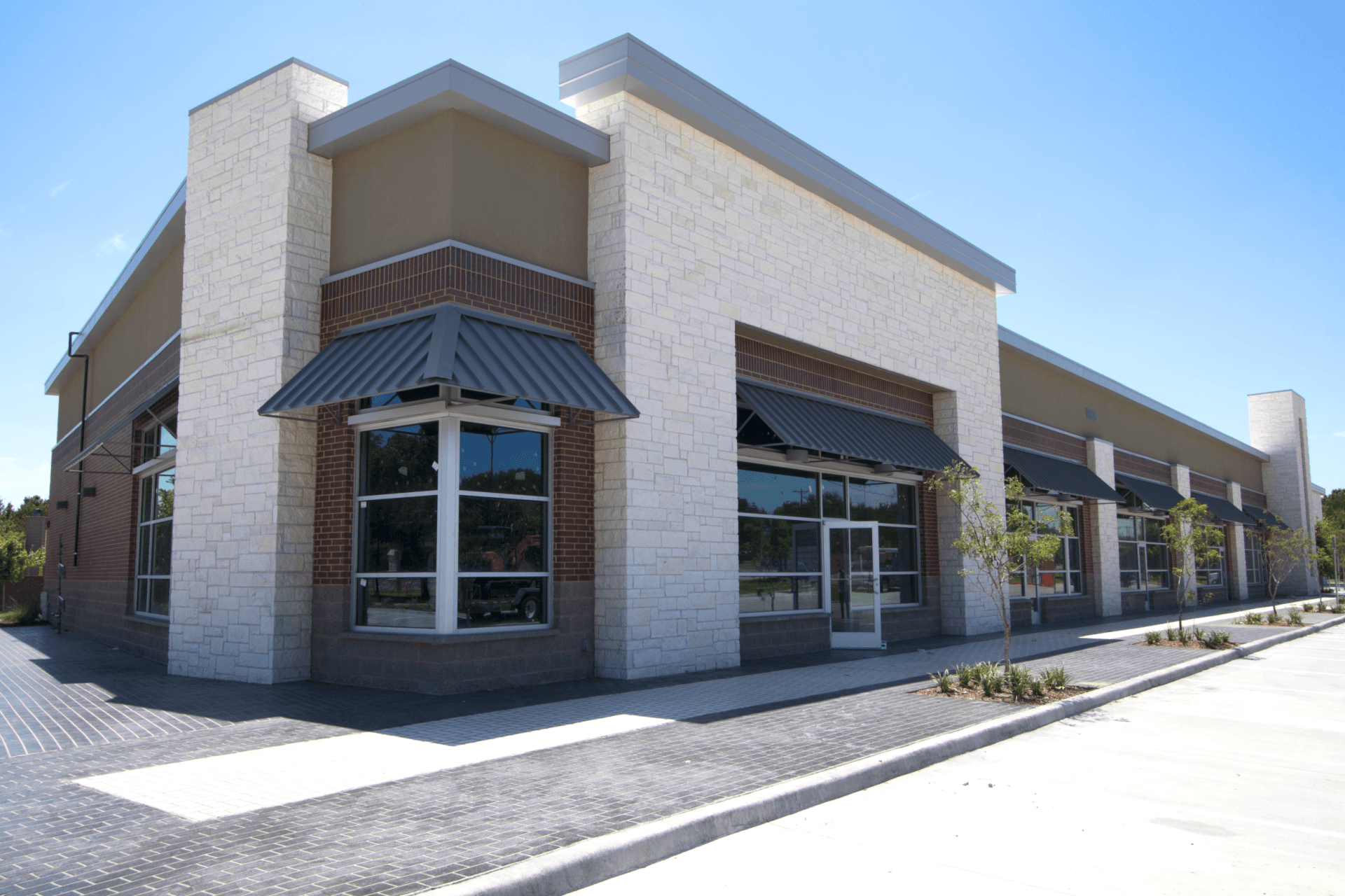 A large building with a lot of windows and awnings