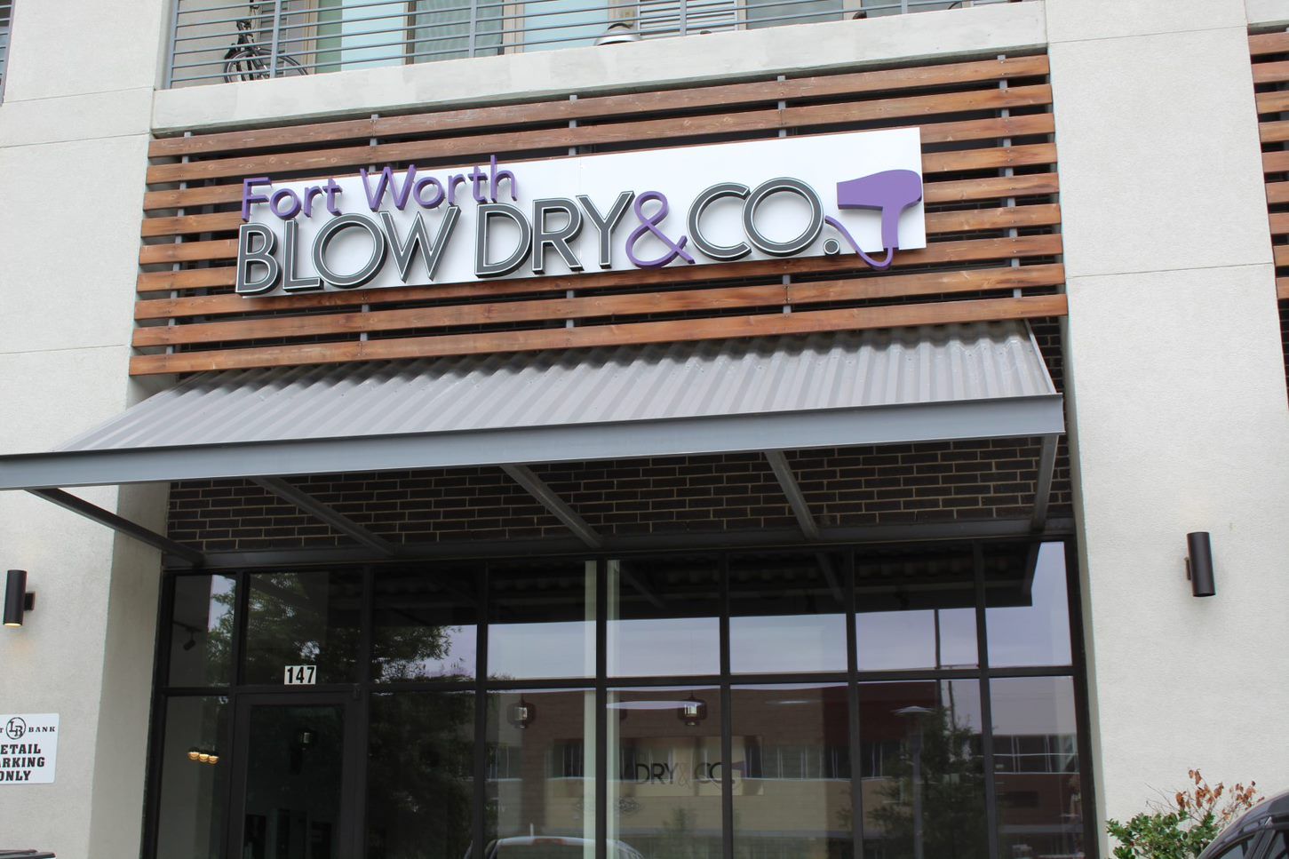 A store front for fort worth blow dry & coat