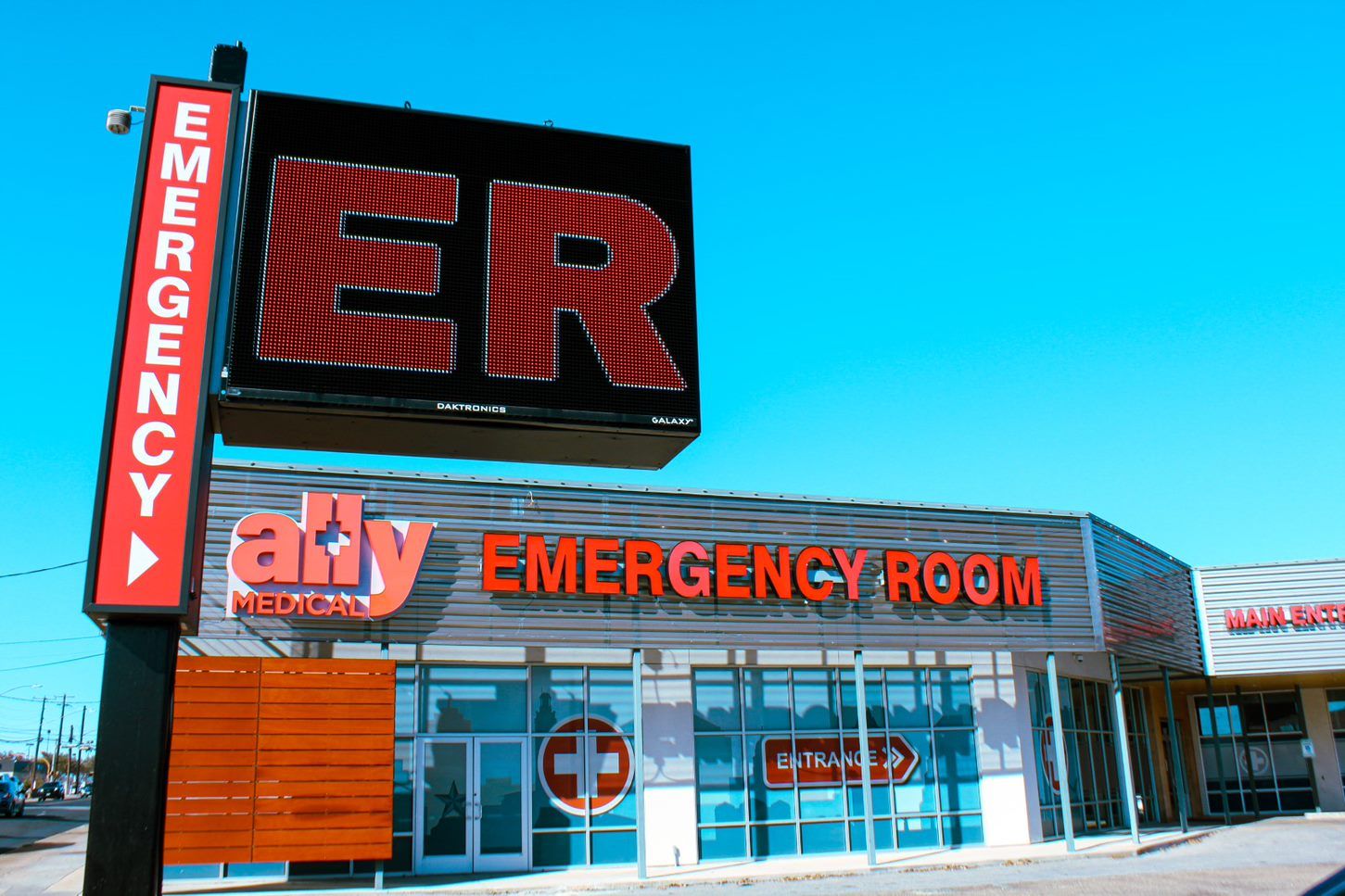 An emergency room with a large sign above it