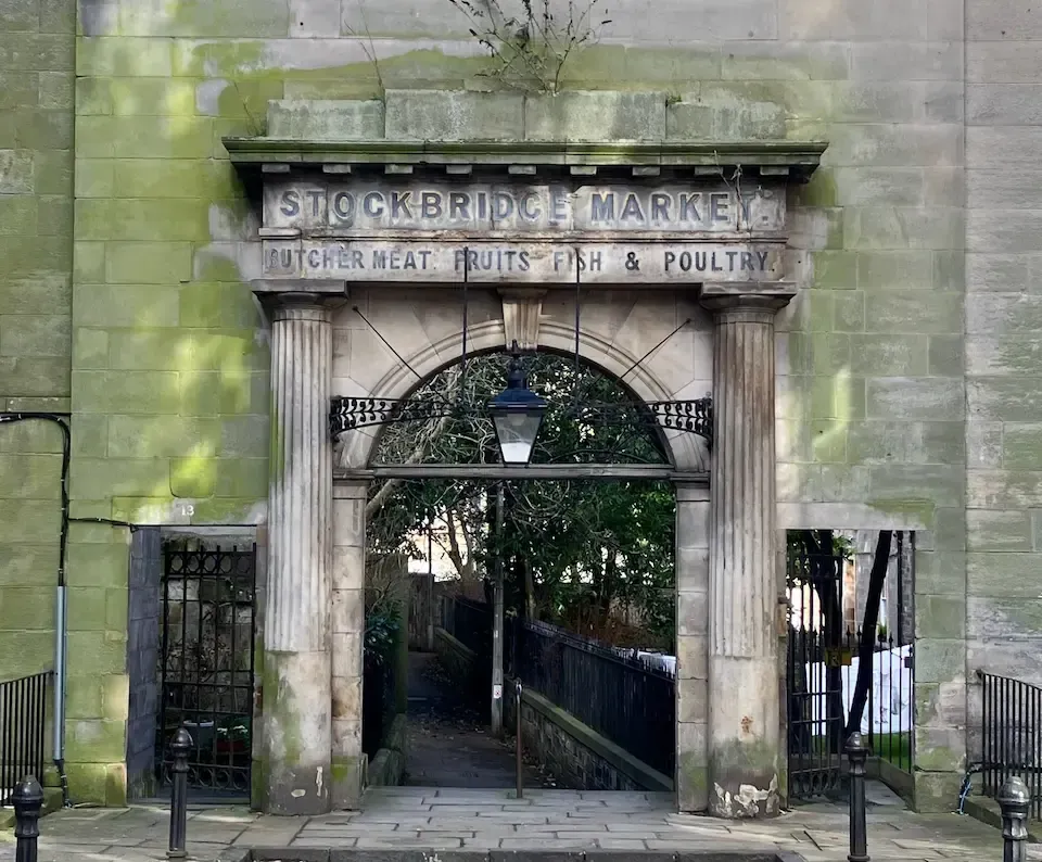Scenic view of Stockbridge Market entrance from a corporate private walking tour around Edinburgh.