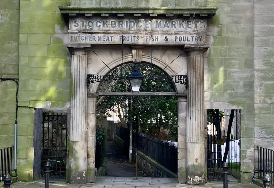Scenic view of Stockbridge Market entrance from a corporate private walking tour around Edinburgh.