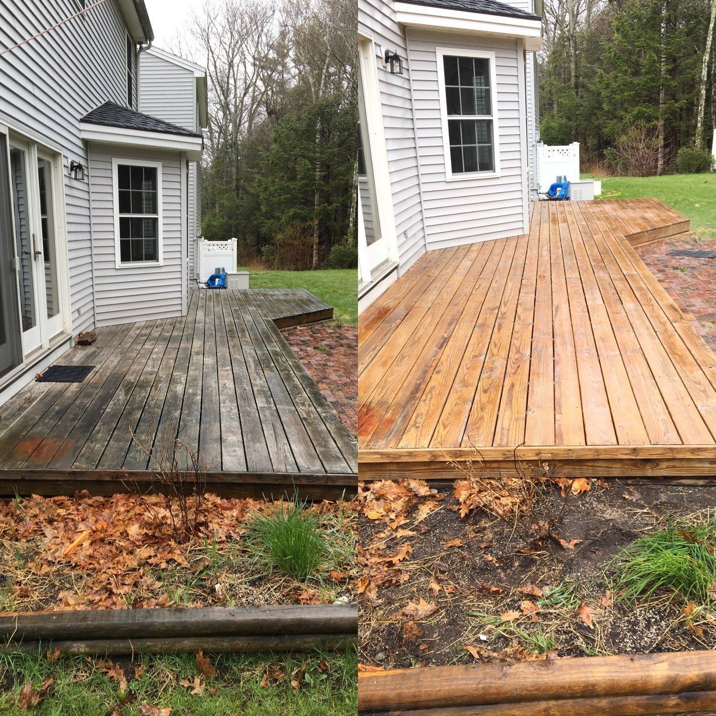 Split wooden deck beside a white house, with dark weathered boards on one side and new light boards on the other.
