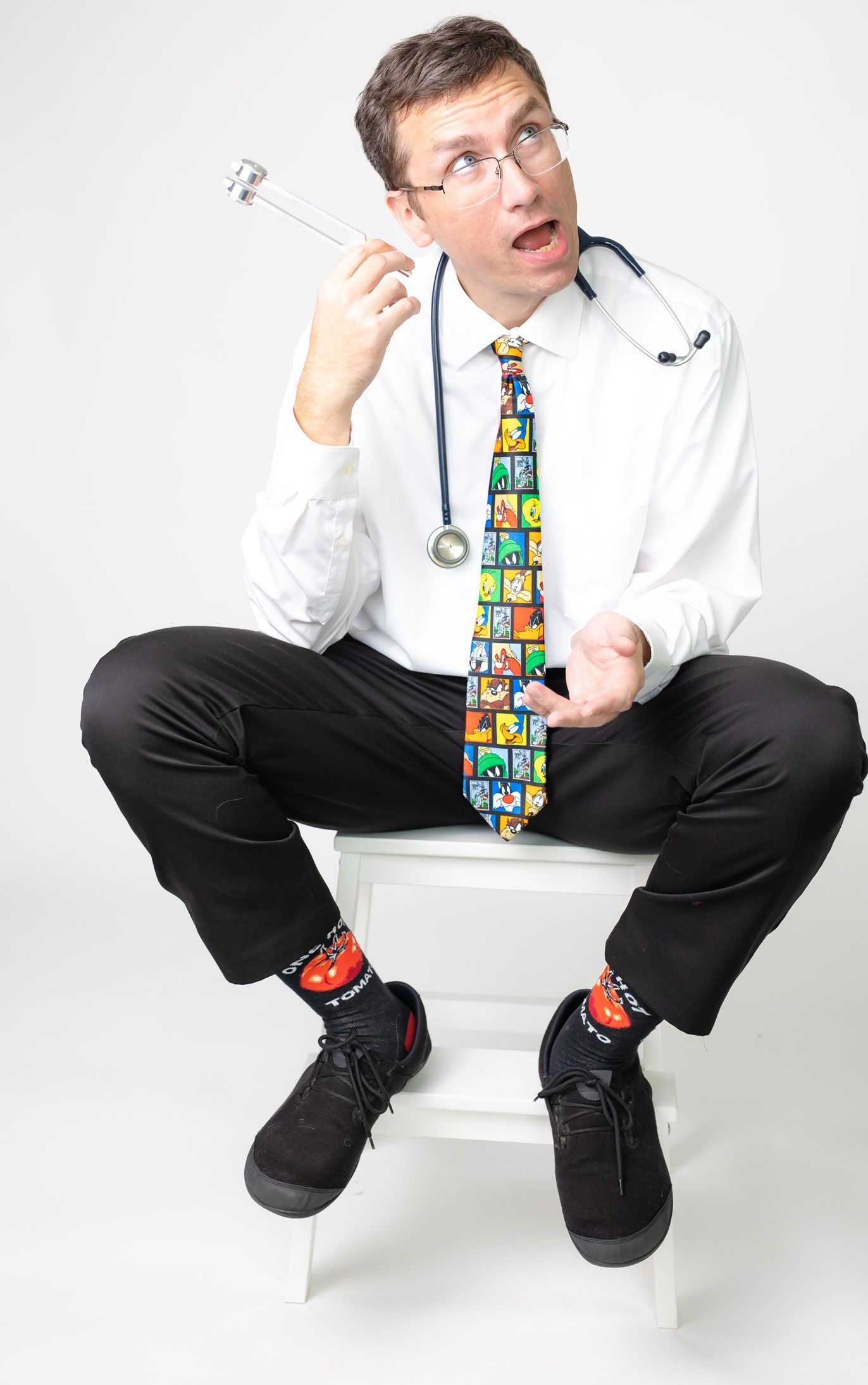 dr dan moore in a fun looney tunes tie
