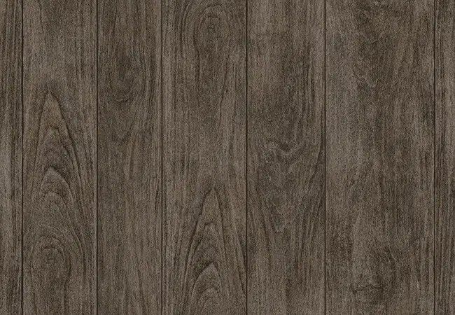 Un gros plan d'une de membrane de PVC couleur planche de chêne royal
