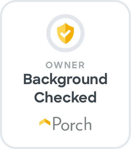 Porch badge reading “Owner Background Checked” with a yellow shield icon on white background