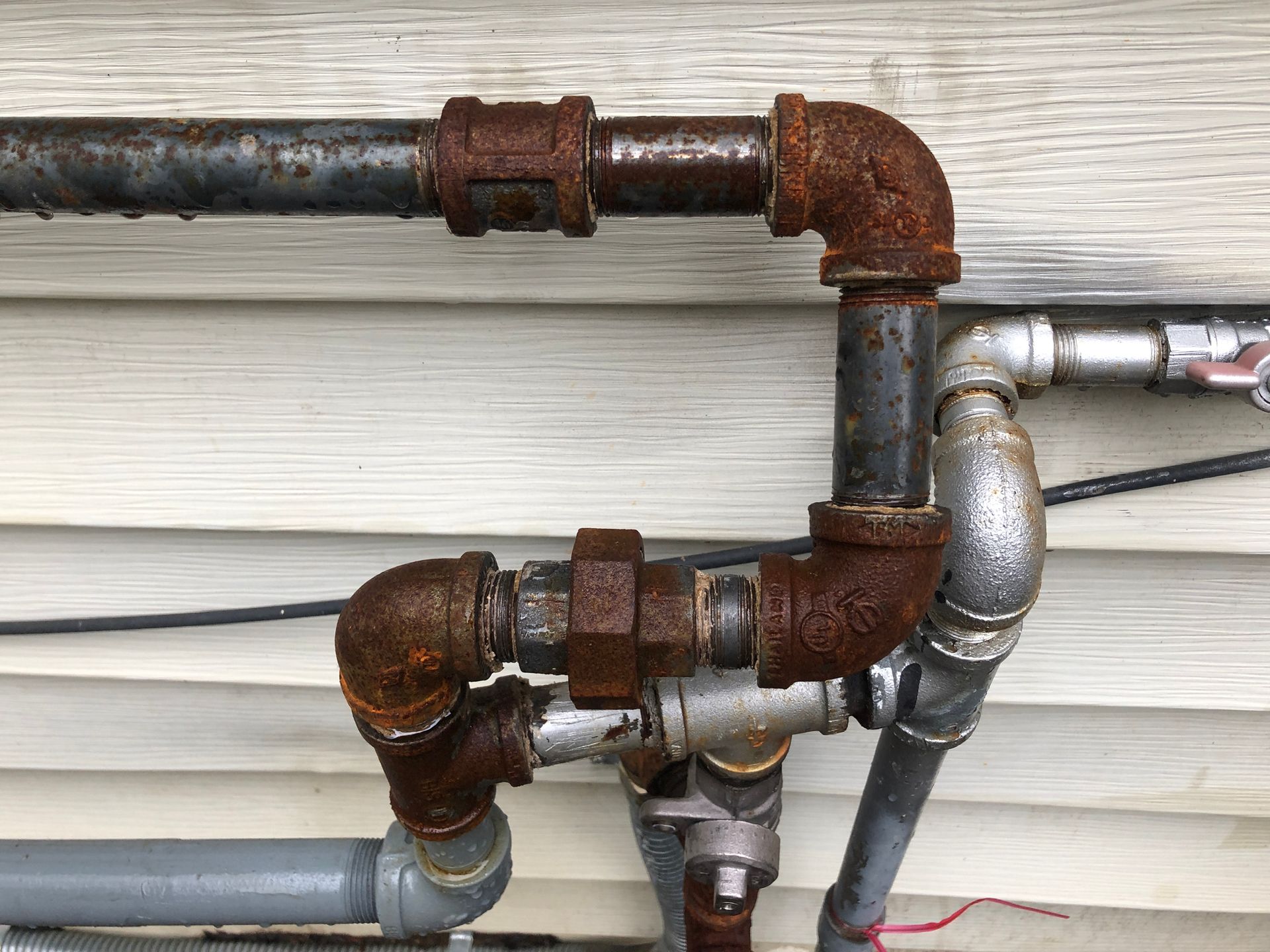 Rusty Metal Water Pipes
