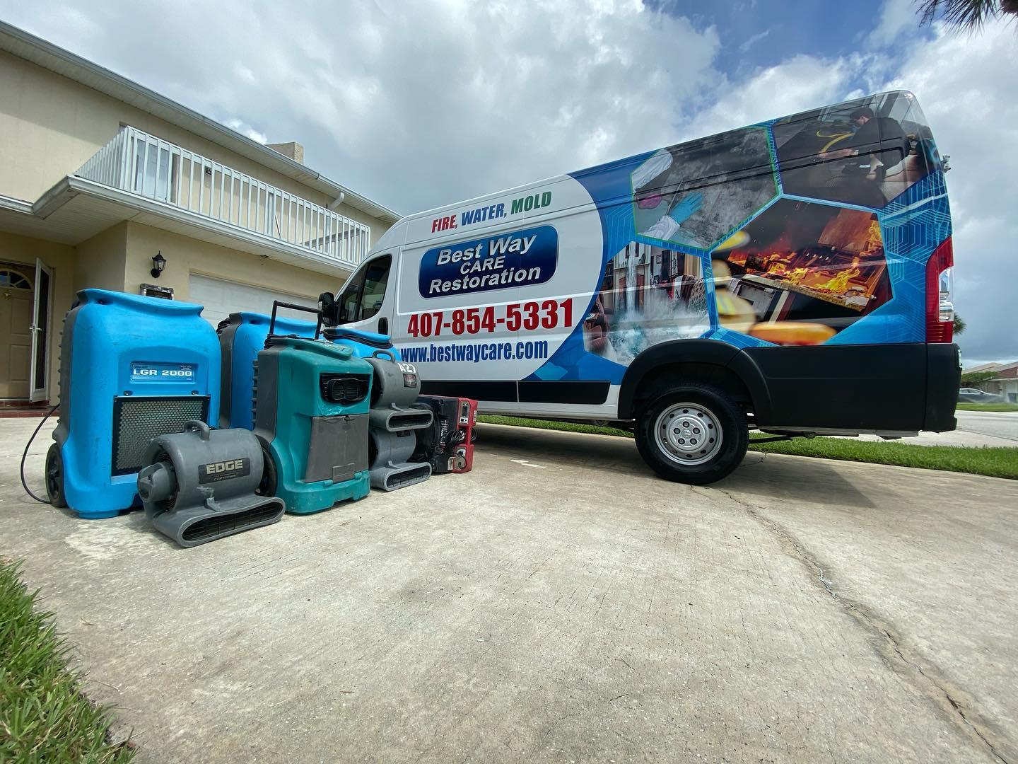 West Way Restoration van with water damage restoration equipment on a driveway.