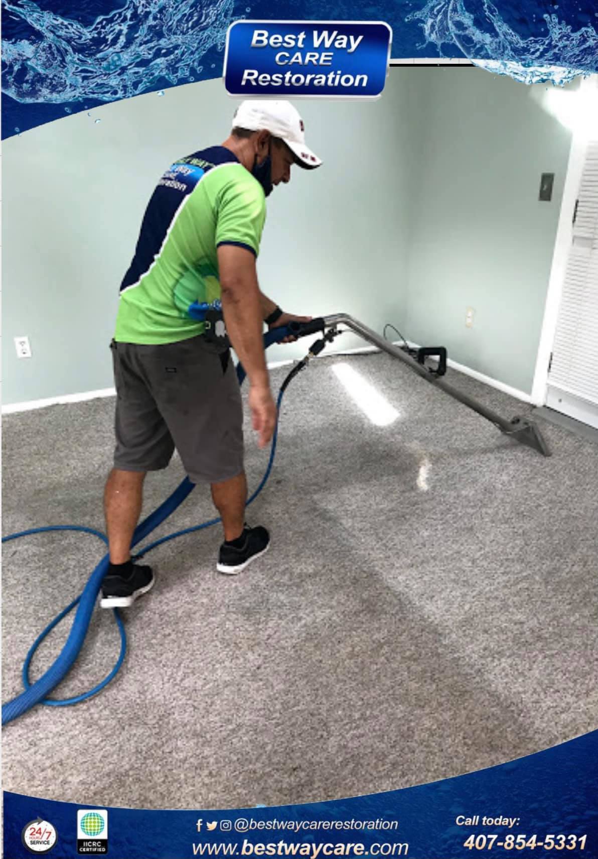 Man cleaning carpet with industrial machine in a room.