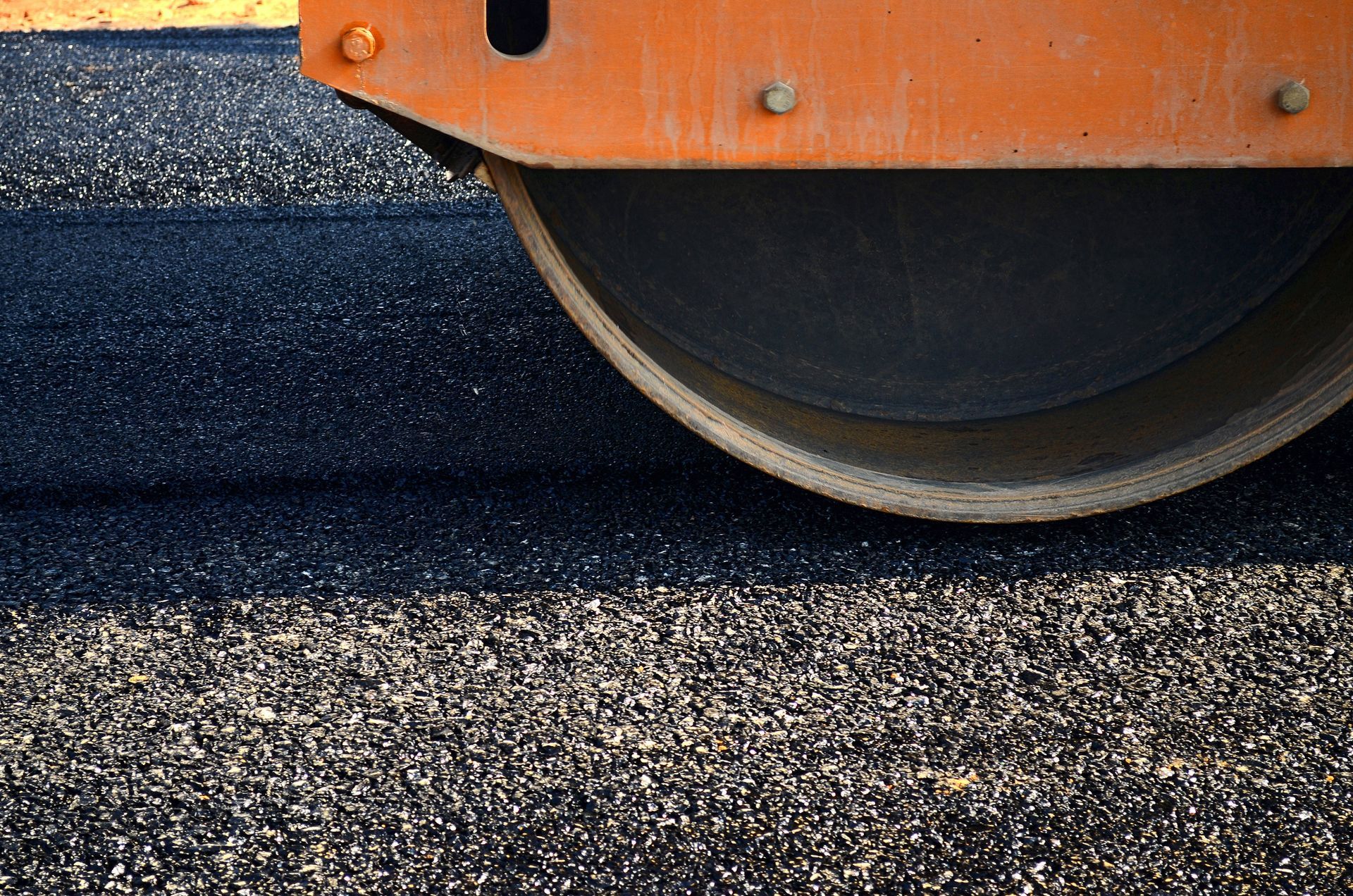 A Close up Of a Roller on A Road — Paving Contractors In Butler, PA A Close up Of a Roller on A Road — Paving Contractors In Butler, PA