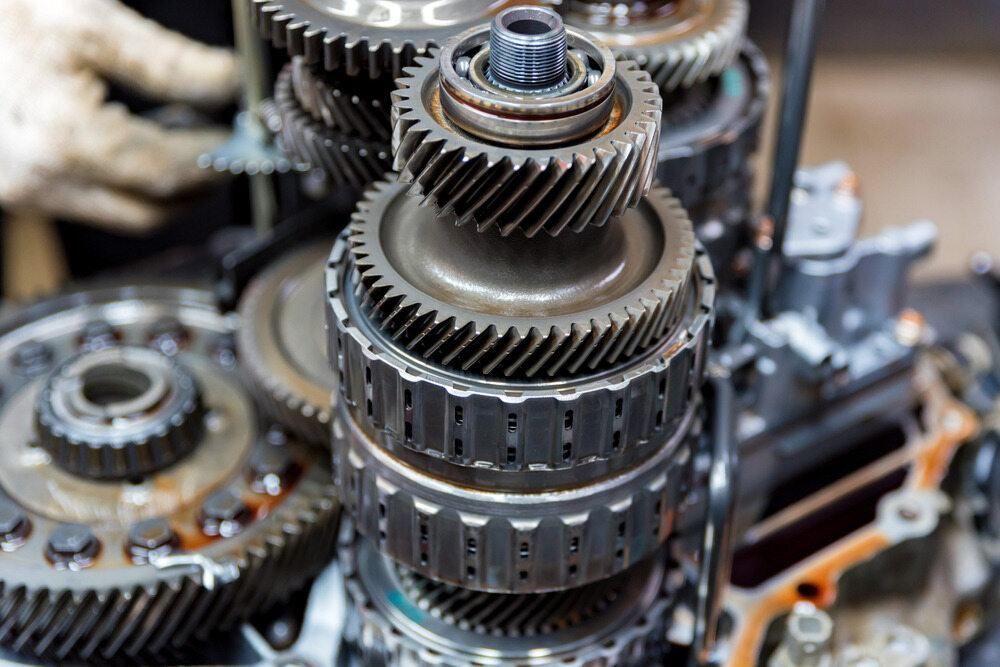 A Close Up Of A Stack Of Gears On Top Of Each Other On A Machine — Burleigh Automatics In Burleigh Heads, QLD