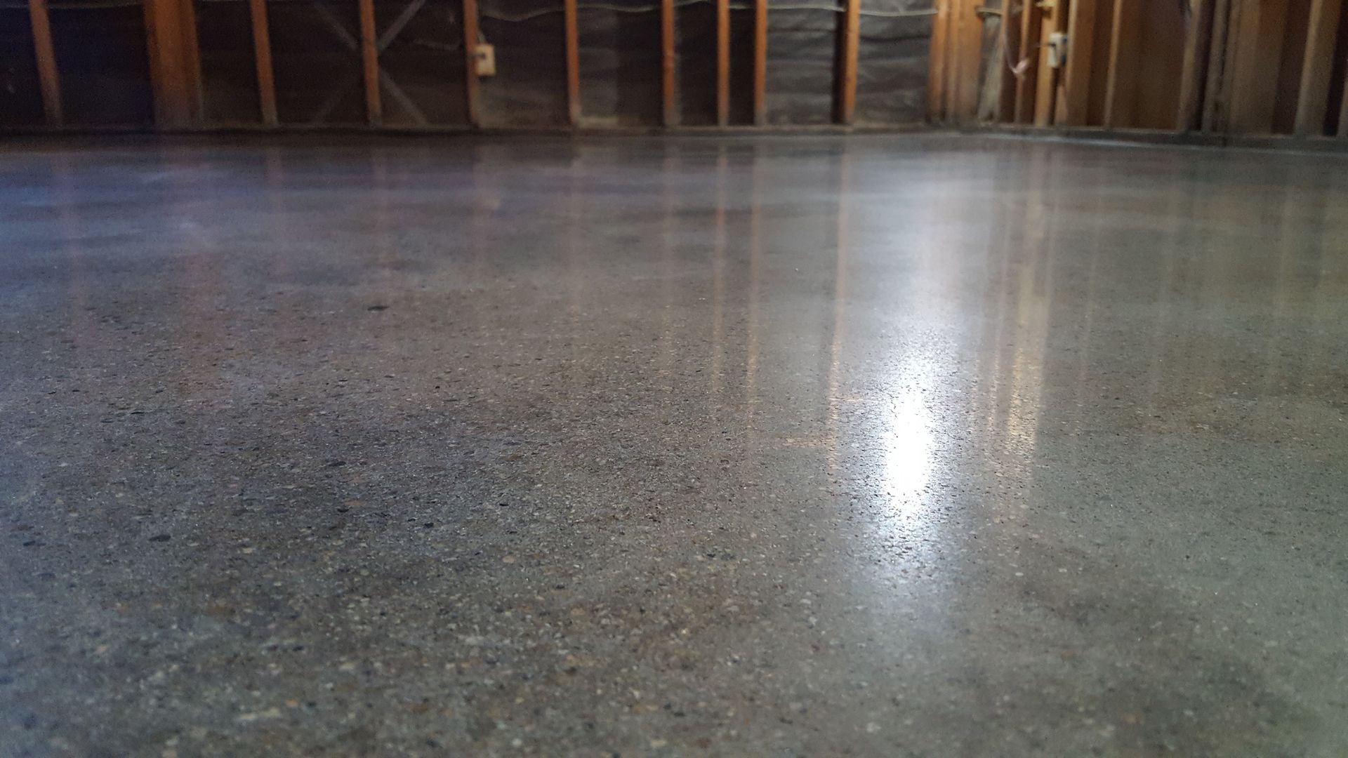 A close up of a concrete floor in a room.