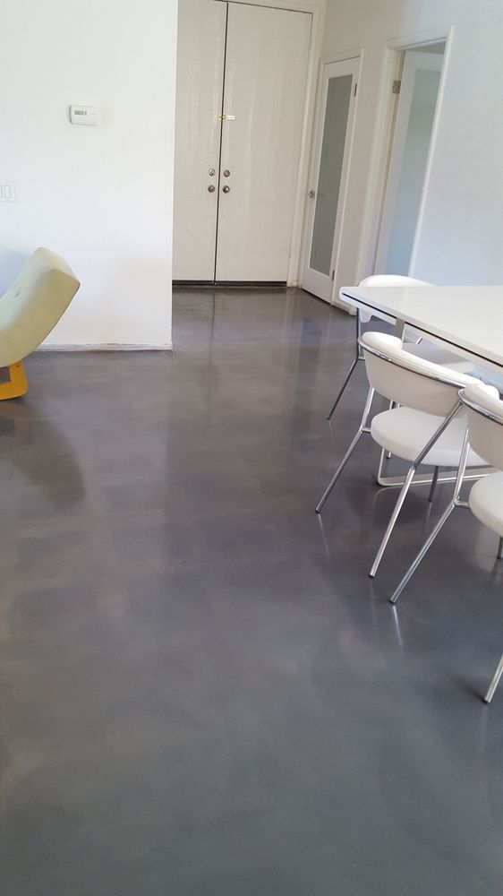 A room with a polished concrete floor.