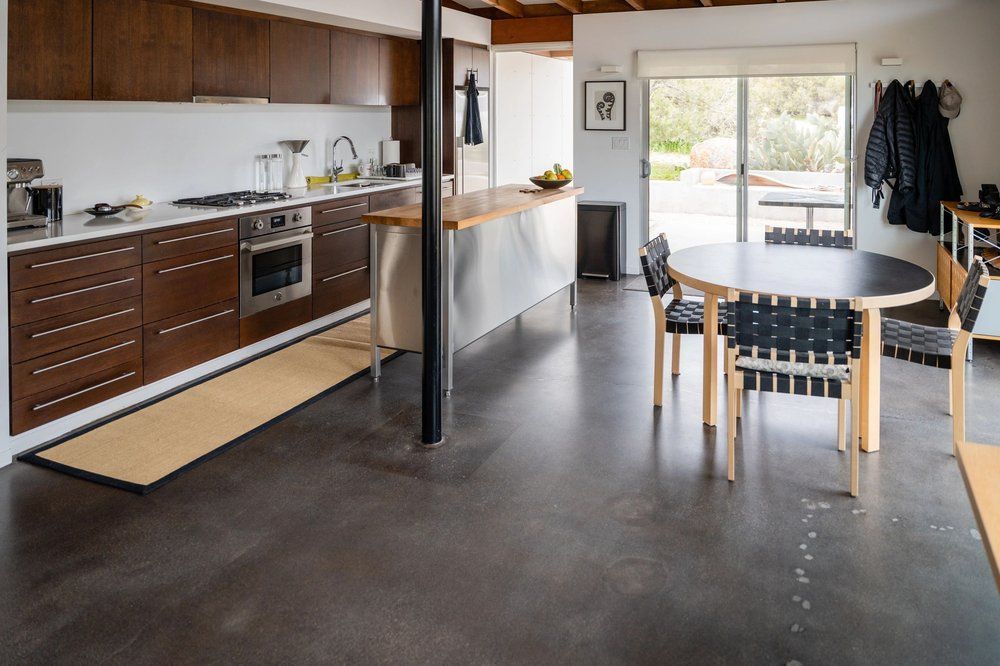 Kitchen with a polished concrete floor.