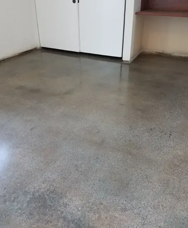 A close up of a concrete floor in a room.