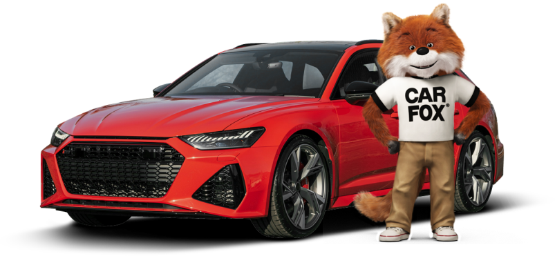 Red sports car beside a fox mascot holding a Car Fox sign and a blue service center badge | Trask AUtomotive